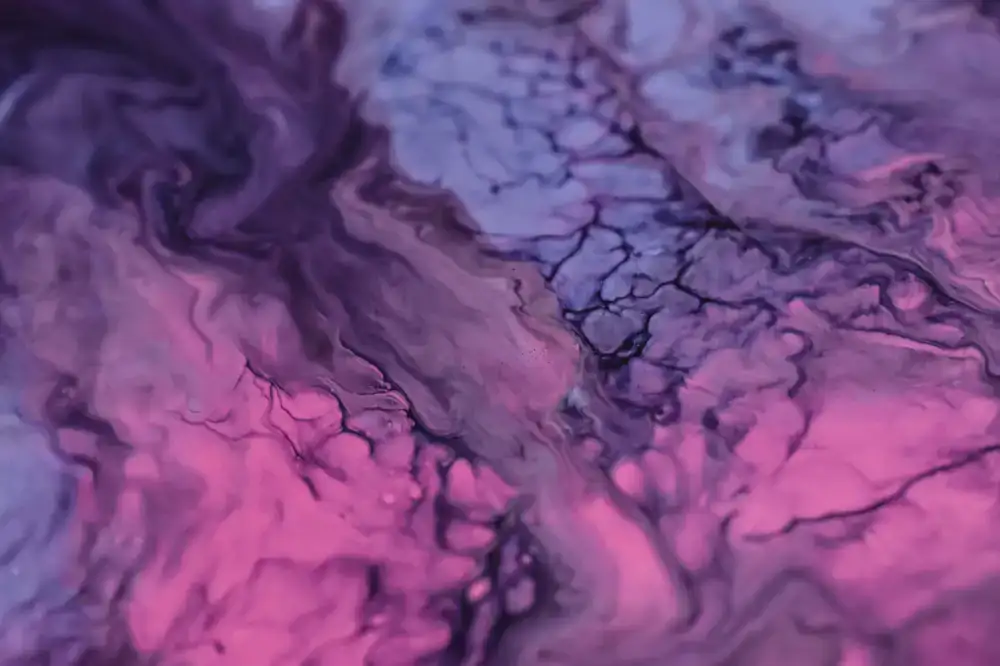 Abstract marbled paper pattern in rich ink and lilac hues